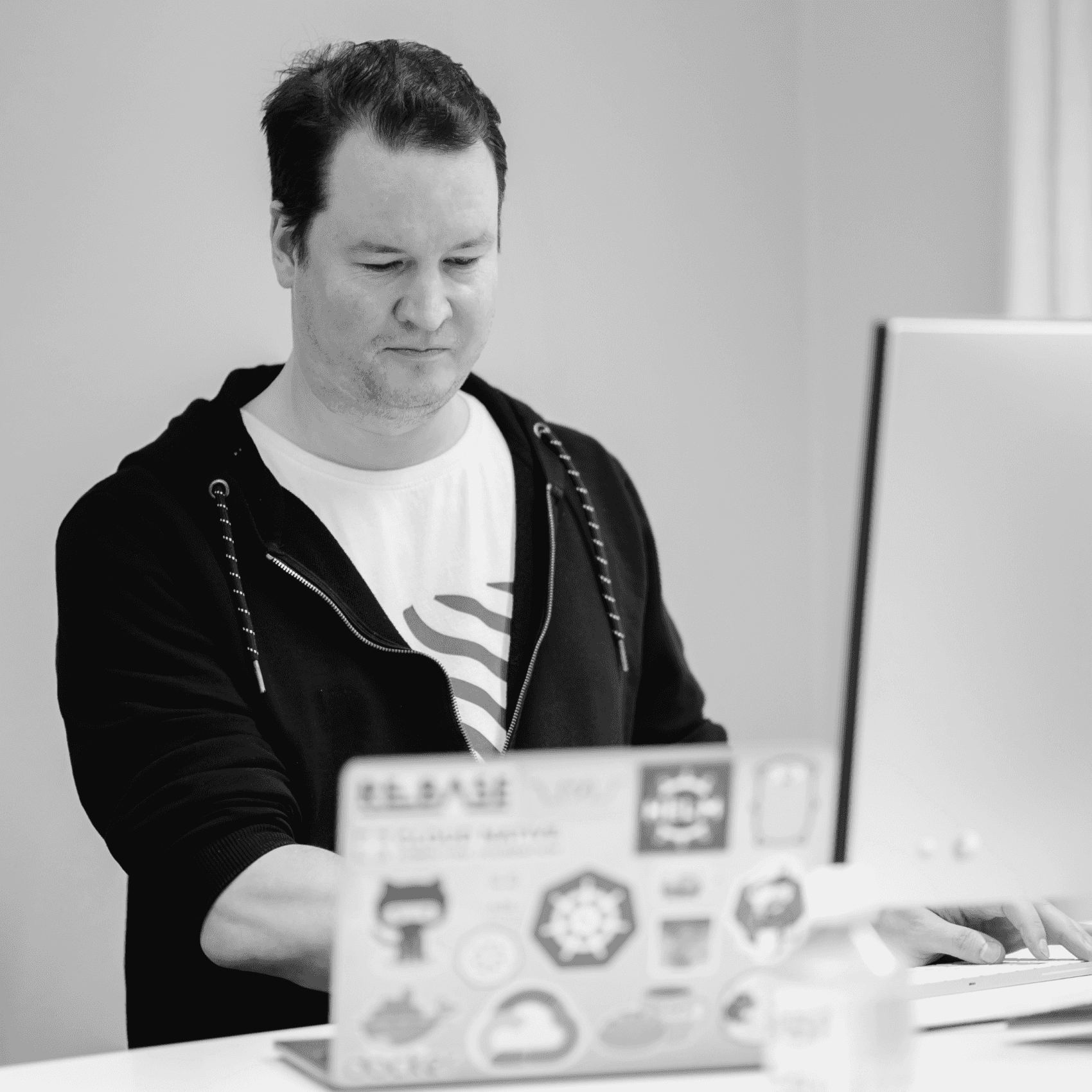 Rebase employee working on a laptop